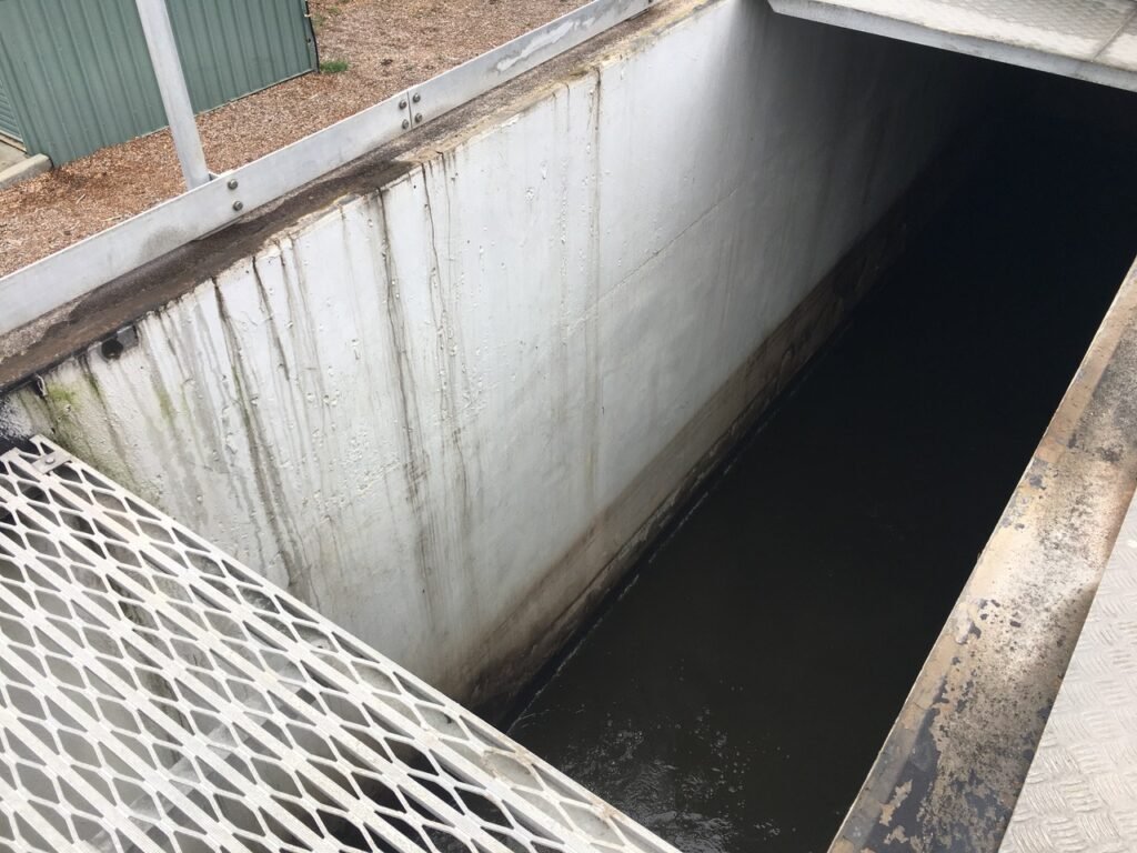 GoonaGuard applied in a municipal wastewater inlet structure in Australia over a decade ago. Applied over SewperCoat and Epoxy, it bonds to almost anything and has superior MIC or biogenically induced corrosion and far better acid resistance.